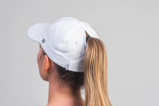 Baseball cap with a ponytail slot, ideal as a sun hat or dad hat, keeping you cool and comfortable outdoors.