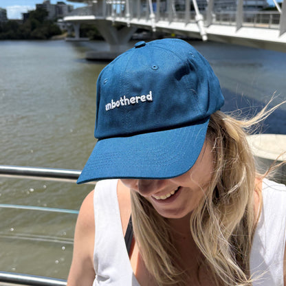 "Unbothered" Adjustable Unisex Slogan Baseball Cap (available in 2 colours)