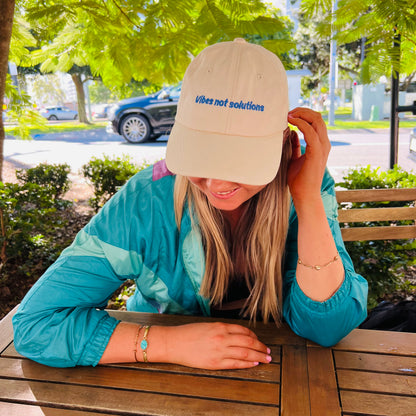 "Vibes not solutions" Adjustable Unisex Baseball Cap (available in 5 colours)