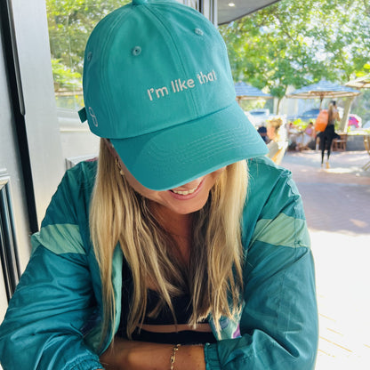 Poppy Talls "I'm like that" cap in turquoise 